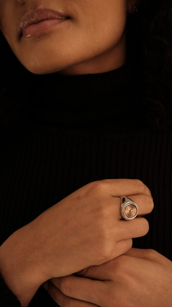 Men’s gold signet ring styled with tailored clothing